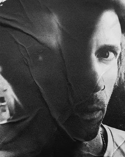 Portrait half in shadow, black and white